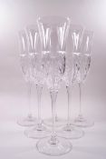 A set of six Waterford cut glass champagne flutes,
