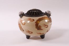 A Japanese earthenware Koro and metal cover,