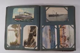A collection of Victorian and later postcards within an album and loose, including greetings,