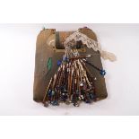 A large quantity of Victorian wooden and bone lace bobbins with glass spangles,
