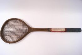 A late 19th/early 20th century tennis racquet, stamped Asser & Sherwin, Strand, London,