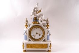 A 19th century French porcelain and ormolu mantel clock, the eight day movement striking on a bell,