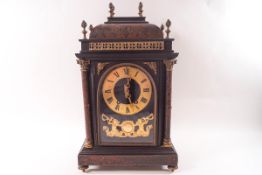 A 19th century French boulle mantel clock, the eight day movement striking on a gong,
