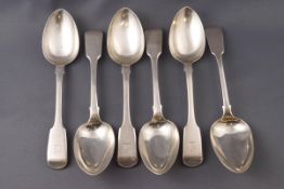 A set of five silver fiddle pattern dessert spoons, each engraved with a crest, London 1790,
