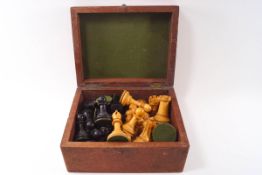 A Staunton turned ebony and boxwood chess set, possibly by Jacques and Son, unstamped,
