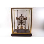 A skeleton clock with eight day fusee movement and grasshopper escape, cased and on a stand,