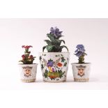 Three miniature Dresden porcelain flower pots, the largest painted with insects and exotic birds,