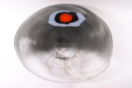 A large Art glass dish with an orange,