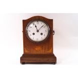 An Edwardian inlaid mahogany eight day mantel clock, 24cm high,