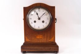 An Edwardian inlaid mahogany eight day mantel clock, 24cm high,