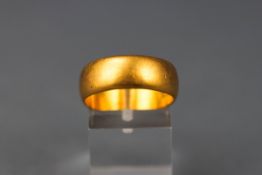 A yellow gold D shape wedding ring, 7.4mm. Hallmarked 22ct gold, Birmingham, 1907.
