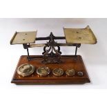 A set of early 20th century Postal scales and weights,