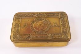 A 1914 Christmas tin containing an un-opened pack of tobacco