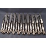 A set of nine 19th century dessert knives and forks,