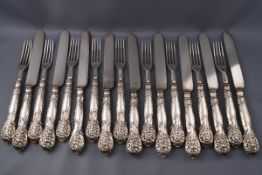 A set of nine 19th century dessert knives and forks,