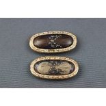 A George III two-part mourning buckle both consisting of human hair with an entwined rose cut
