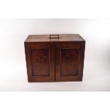 A 19th century flame mahogany table top cabinet of eight drawers, possibly a surgeon's chest,