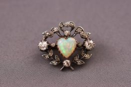 A Victorian yellow and white metal diamond and heart shaped opal sweetheart brooch set with two old