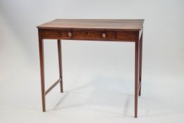A George III mahogany side table with one frieze drawer on sqaure tapering legs,