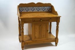 A Victorian tile back pine wash stand,