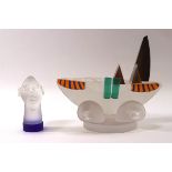 A Borowski Glasstudio model of a boat with a head of a man to the centre, a circular stand,