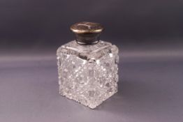 A Victorian square silver mounted square cut glass scent bottle, monogrammed, London 1877,