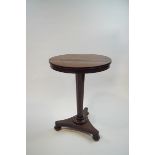 A William IV mahogany occasional table on inverted column and quatre form base,