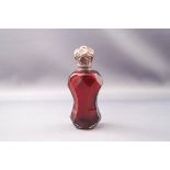 A Victorian red glass scent bottle and stopper, faceted body and silver plate hinged cover, 10.