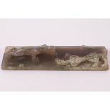 An 18th century Chinese jade carving of two dragons on a rectangular base, 13cm x 3.