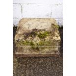 A 19th century stone plinth, weathered,