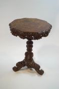 A 19th century Indian carved hardwood table,