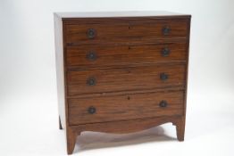 A 19th century mahogany chest of four long graduated drawers with serpentine frieze, 90.
