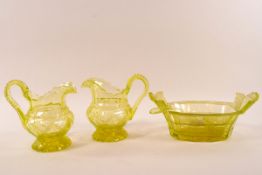 A pair of Victorian uranium cut glass jugs with flared foot, 13cm high,