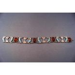 A Continental silver, carnelian and enamel bracelet,