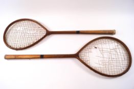 A pair of early 20th century tennis racquets (formerly from Dinder House,