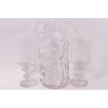 A Swedish moulded glass cylindrical vase, 27cm high, and a pair of Swedish glass goblets,