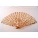 An Edwardian French fan with mother of pearl sticks and lace leaf, in a Duvelleroy box,