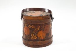 A pokerwork cylindrical box and cover with swing handle decorated with f ruit,