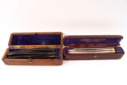 A set of two ivory handled cut throat razors, the blade stamped J.
