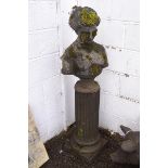 A re-constituted stone bust of a classical lady on a column base,