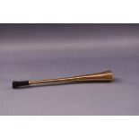 An Art Deco 9ct gold cigarette holder by Alfred Dunhill, of tapering facetted form,