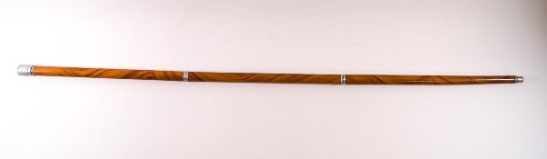 A 1930's sectional walking cane with white metal tip, unscrewing to reveal a small drinking phial,
