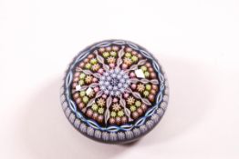 A 20th century glass cane paperweight,