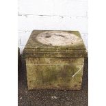 A large re-constituted square plinth,