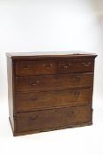 A 19th century oak chest of two short over three long drawers,