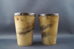 A pair of George III horn beakers with silver liners by Joseph Ash, London 1805,
