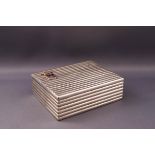 A late 19th century Swedish reeded silver cigarette case with an engraved signature and an