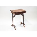 A Victorian mahogany occasional table on slender turned legs,