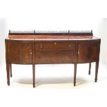 A 19th century mahogany bow front sideboard, crossbanded with ebony stringing,