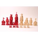 Fourteen Chinese late 19th century carved ivory chess pieces, the King 9.